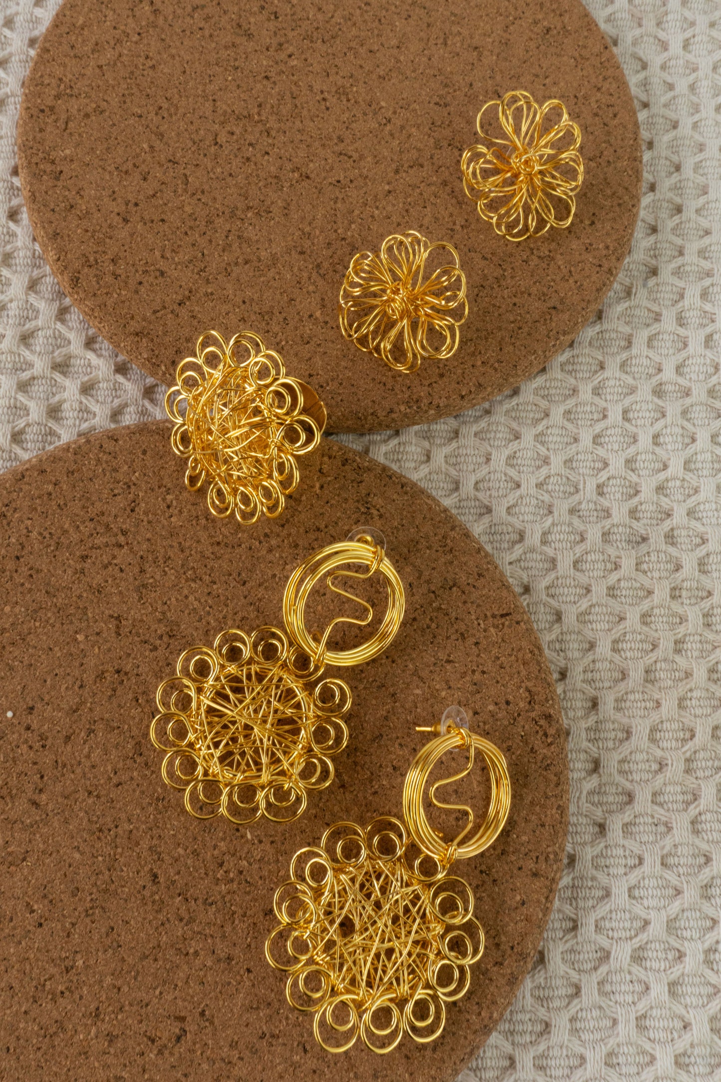 Sketched Sun Set - two pairs of earrings and a ring