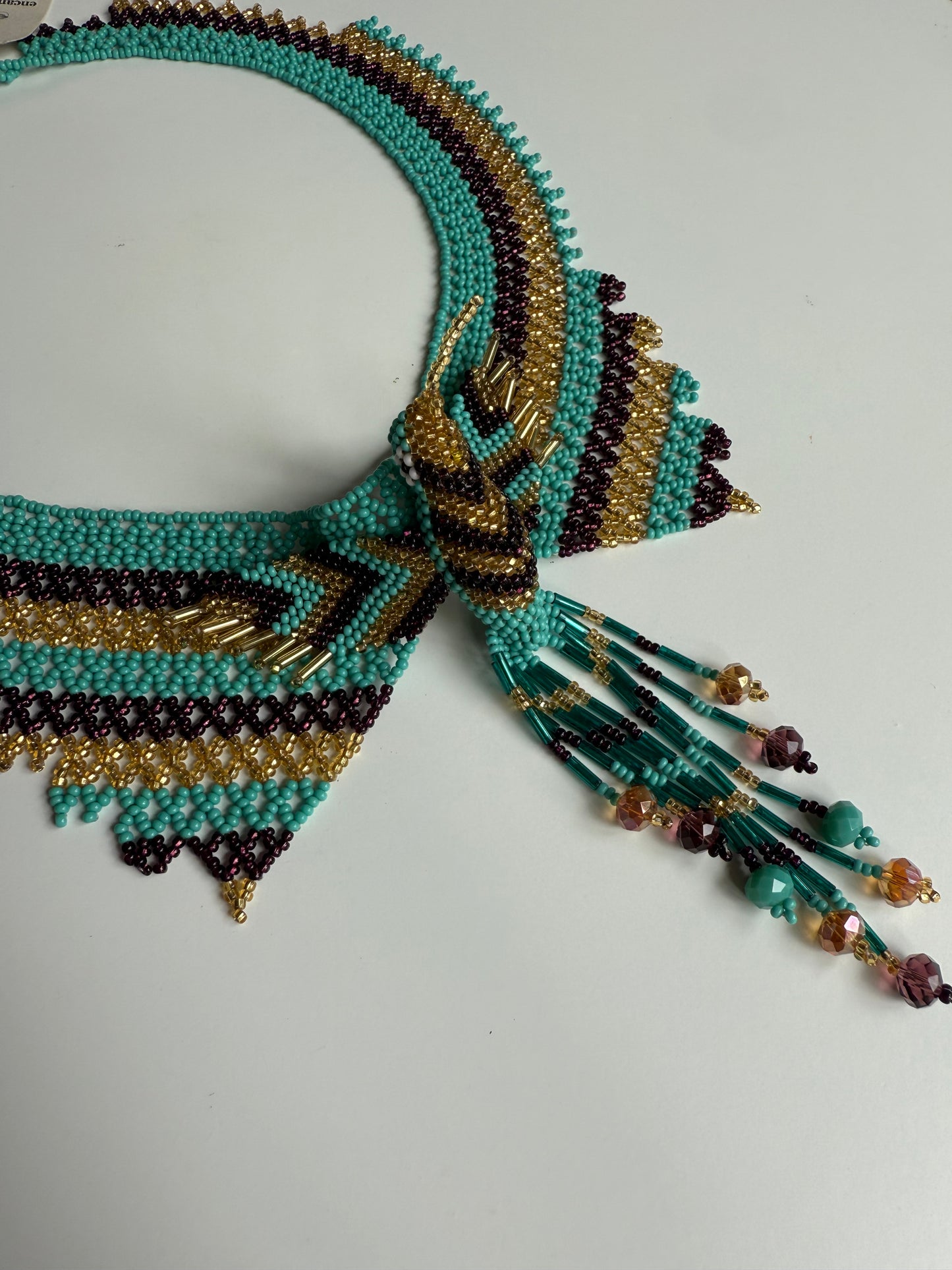 Handcrafted bird-shaped necklace